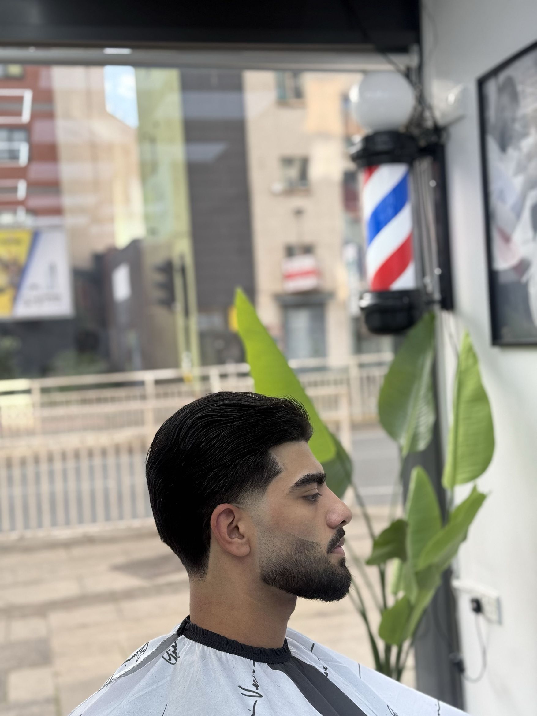 A fresh haircut inside Baran’s Barber on London Road