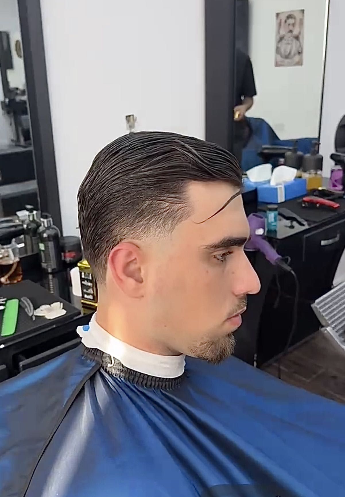 A fresh haircut inside Baran’s Barber on London Road
